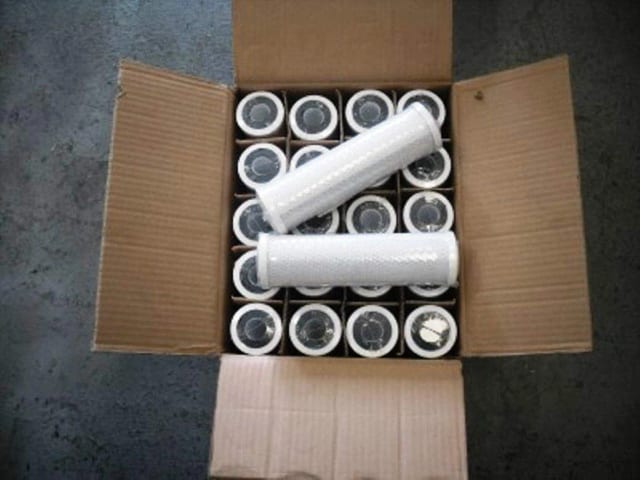 12-pack of 10-inch carbon block water filter cartridges that reduce taste and odor, compatible with GE FXWTC whole house models